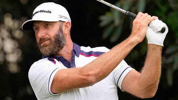 Dustin Johnson watches a shot in the second round of the U.S. Open.
